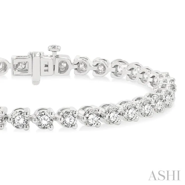 7 Ctw Tri-Prong Round Cut Diamond Bracelet in 14K White Gold