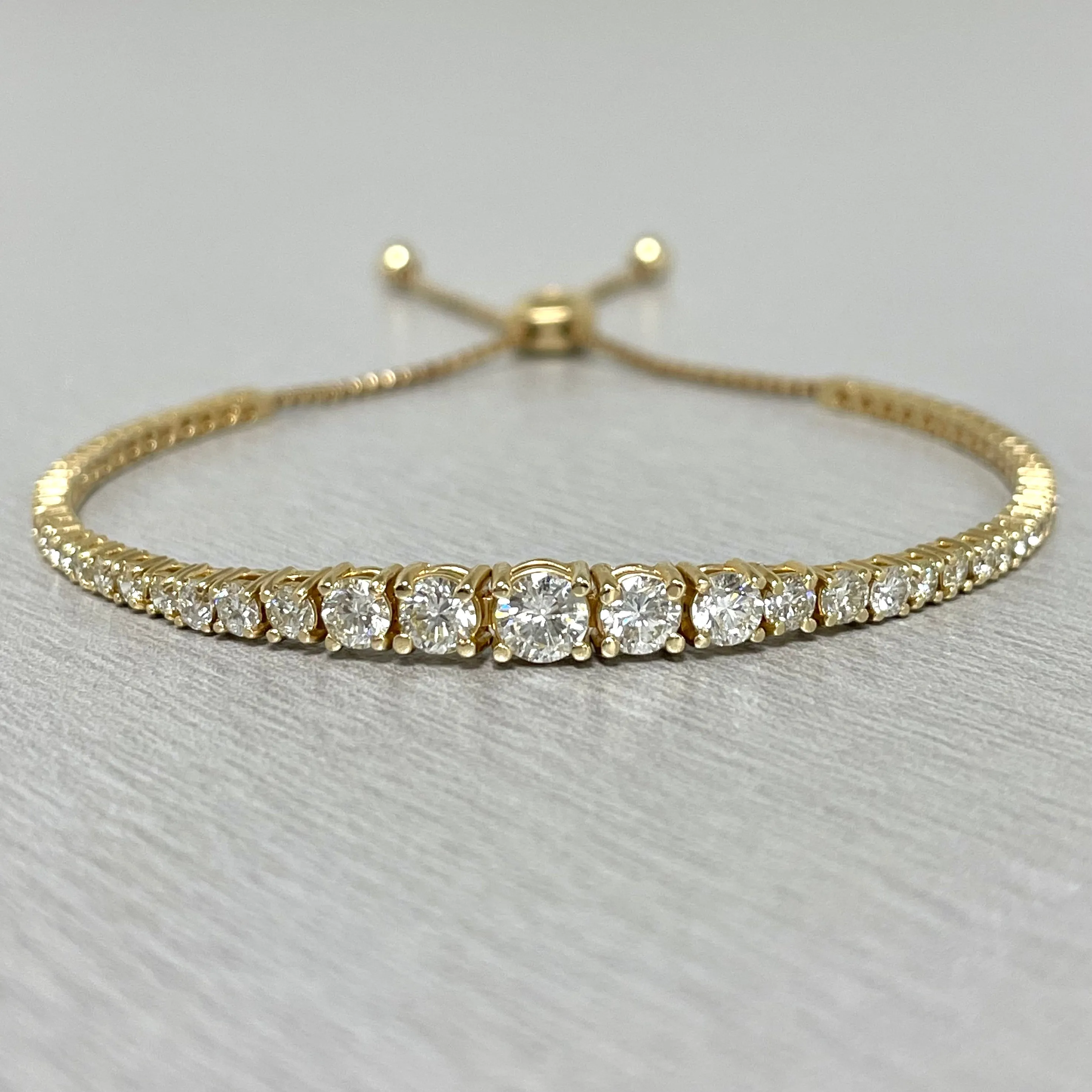 Graduated Bolo Diamond Tennis Bracelet (2.78 ct Diamonds) in Yellow Gold