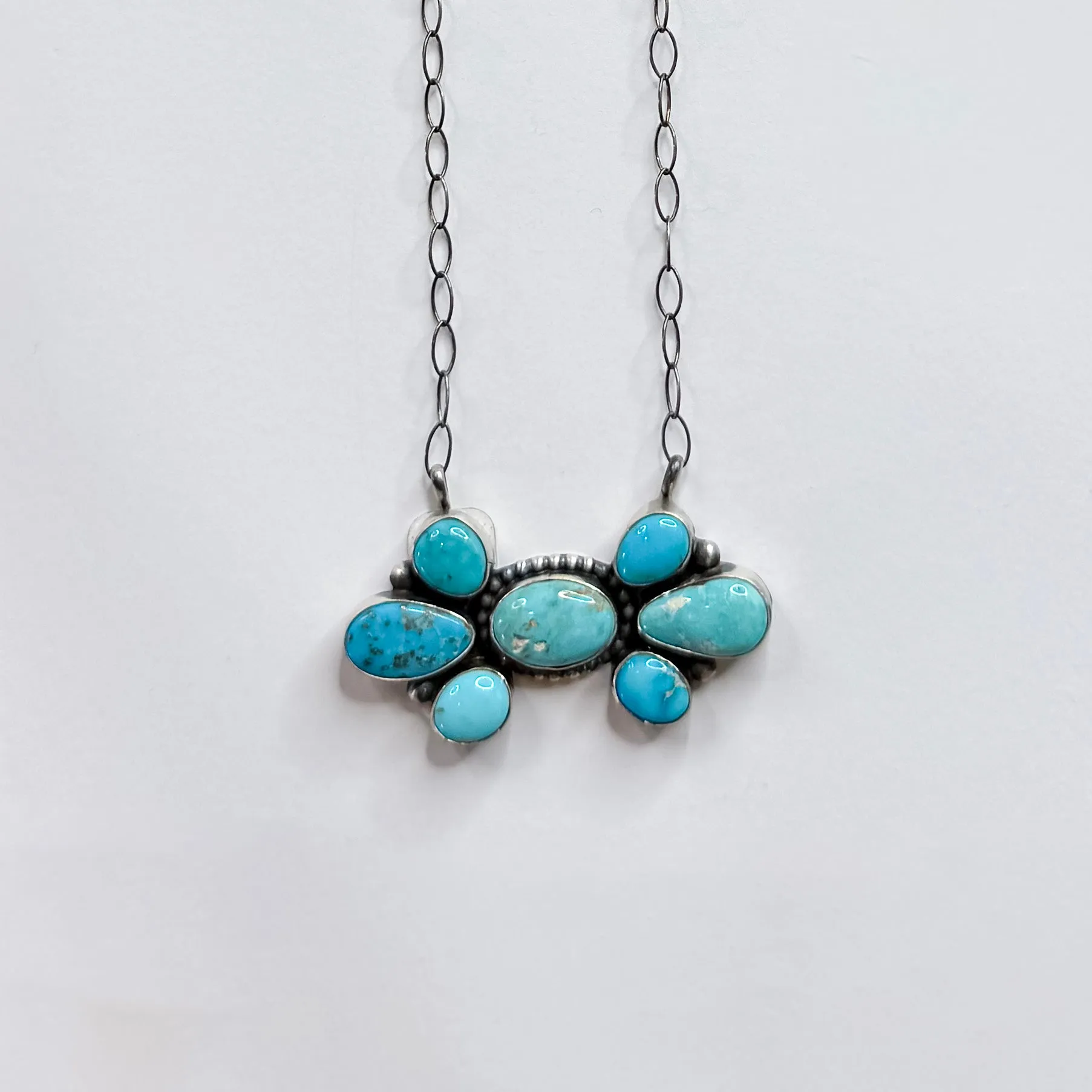 Lorenzo Juan | Navajo Handmade Sterling Silver and Turquoise Stone Cluster Pendant