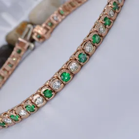 Special 6.00 CT Round Cut Diamond and Green Emerald Tennis Bracelet in 14KT Rose Gold