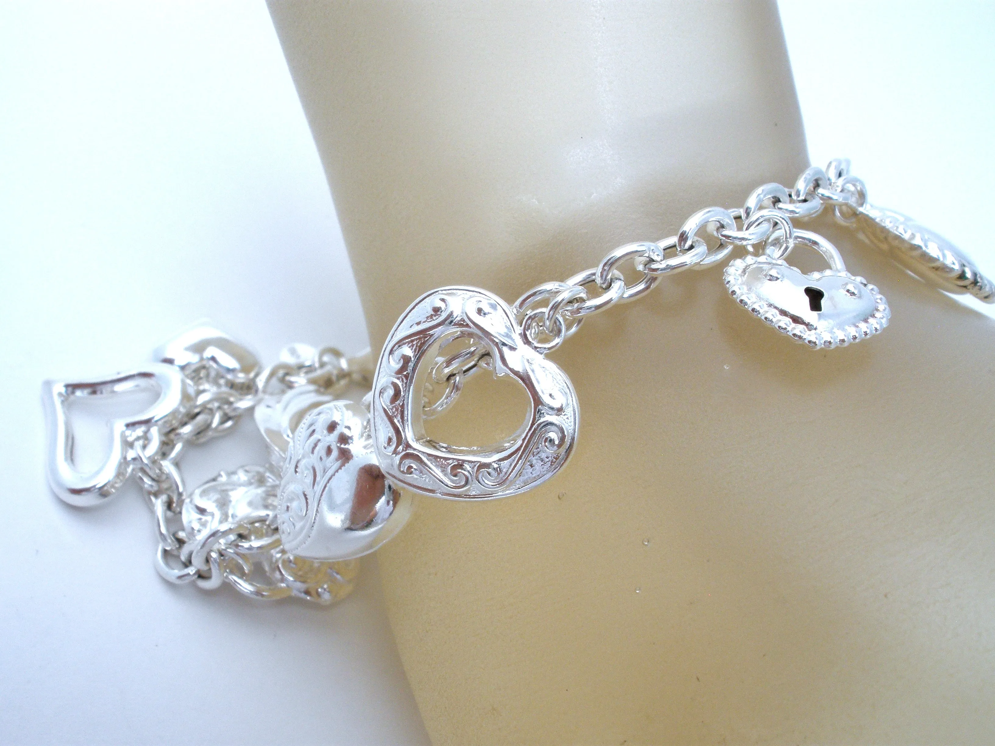 Sterling Silver Charm Bracelet with Hearts JCM