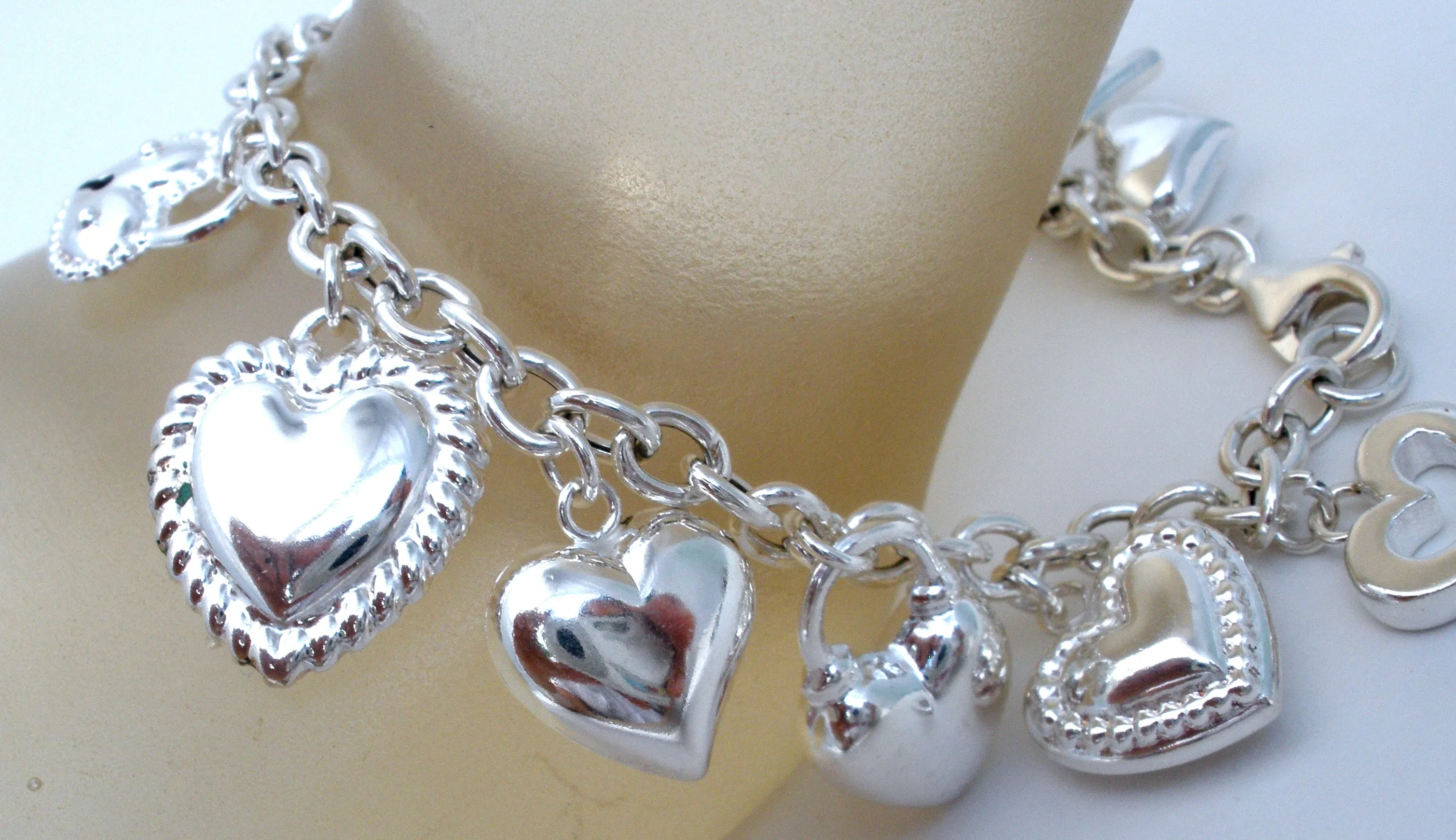 Sterling Silver Charm Bracelet with Hearts JCM