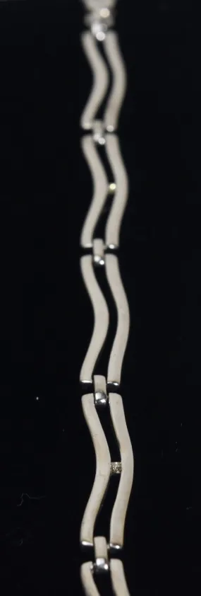 Sterling Silver Wavy Link Bracelet with Tiny Diamonds