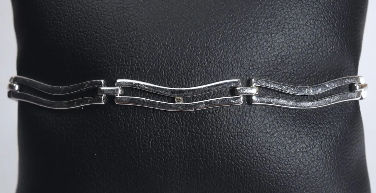 Sterling Silver Wavy Link Bracelet with Tiny Diamonds