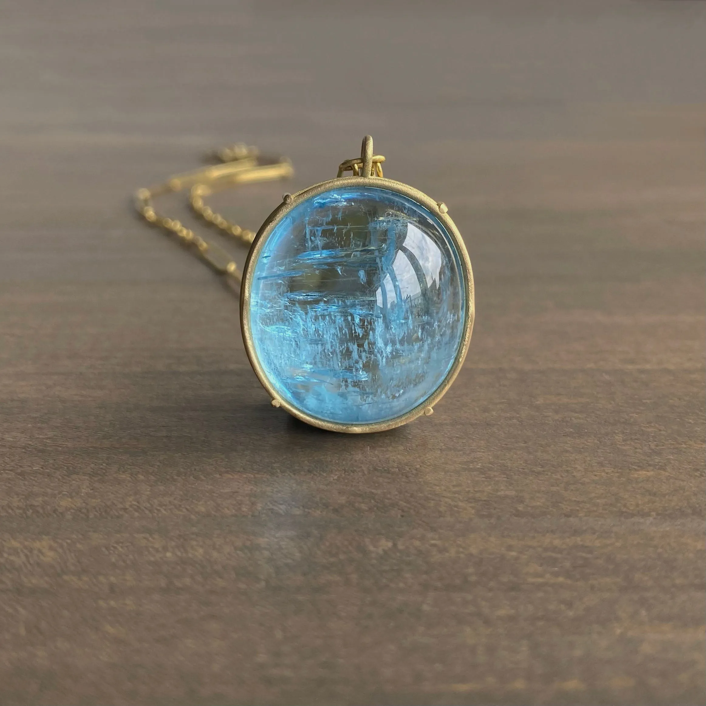 Vivid Aquamarine Cabochon Cage Set Pendant