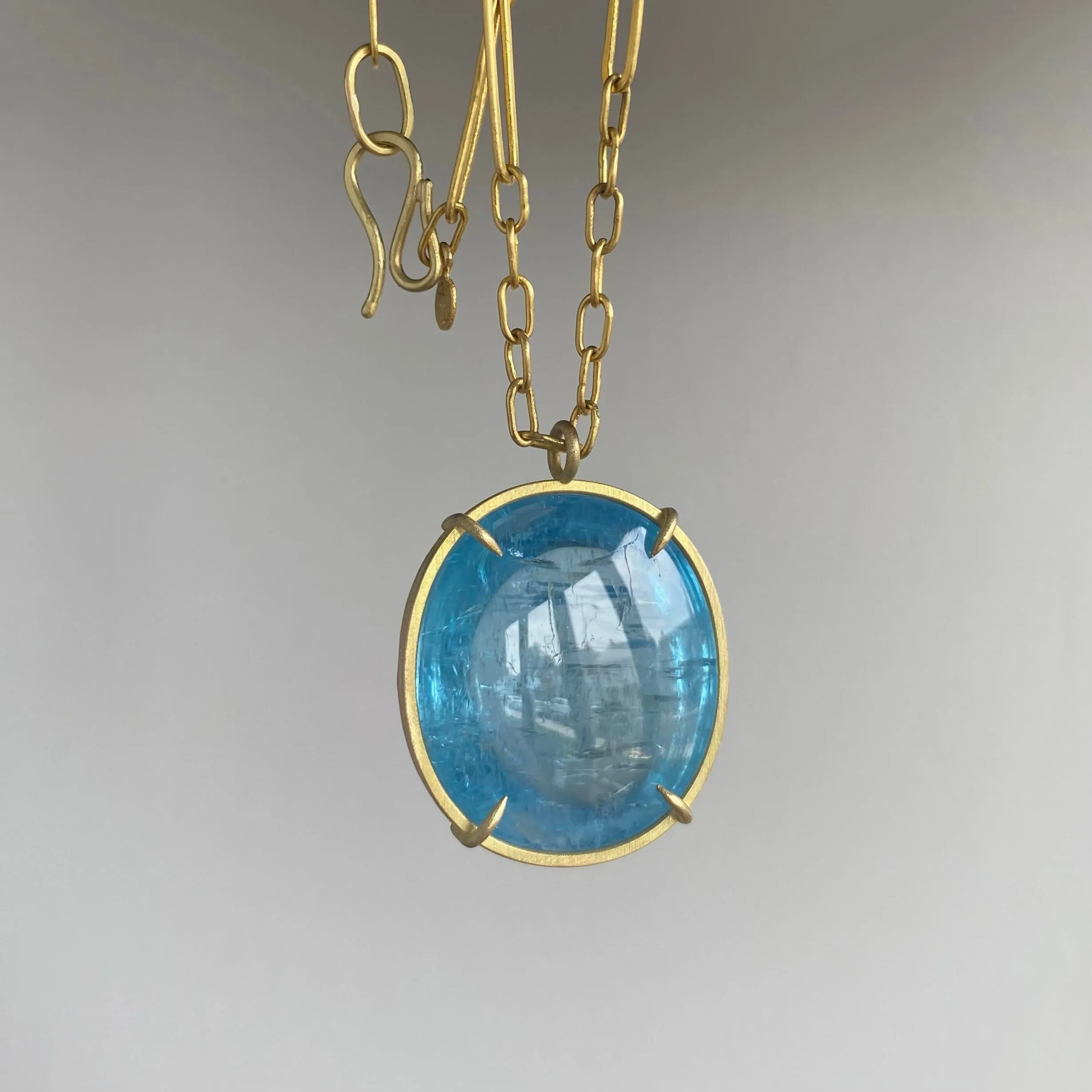 Vivid Aquamarine Cabochon Cage Set Pendant